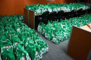 hundreds of green donation bags